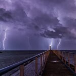 Port_and_lighthouse_overnight_storm_with_lightning_in_Port-la-Nouvelle